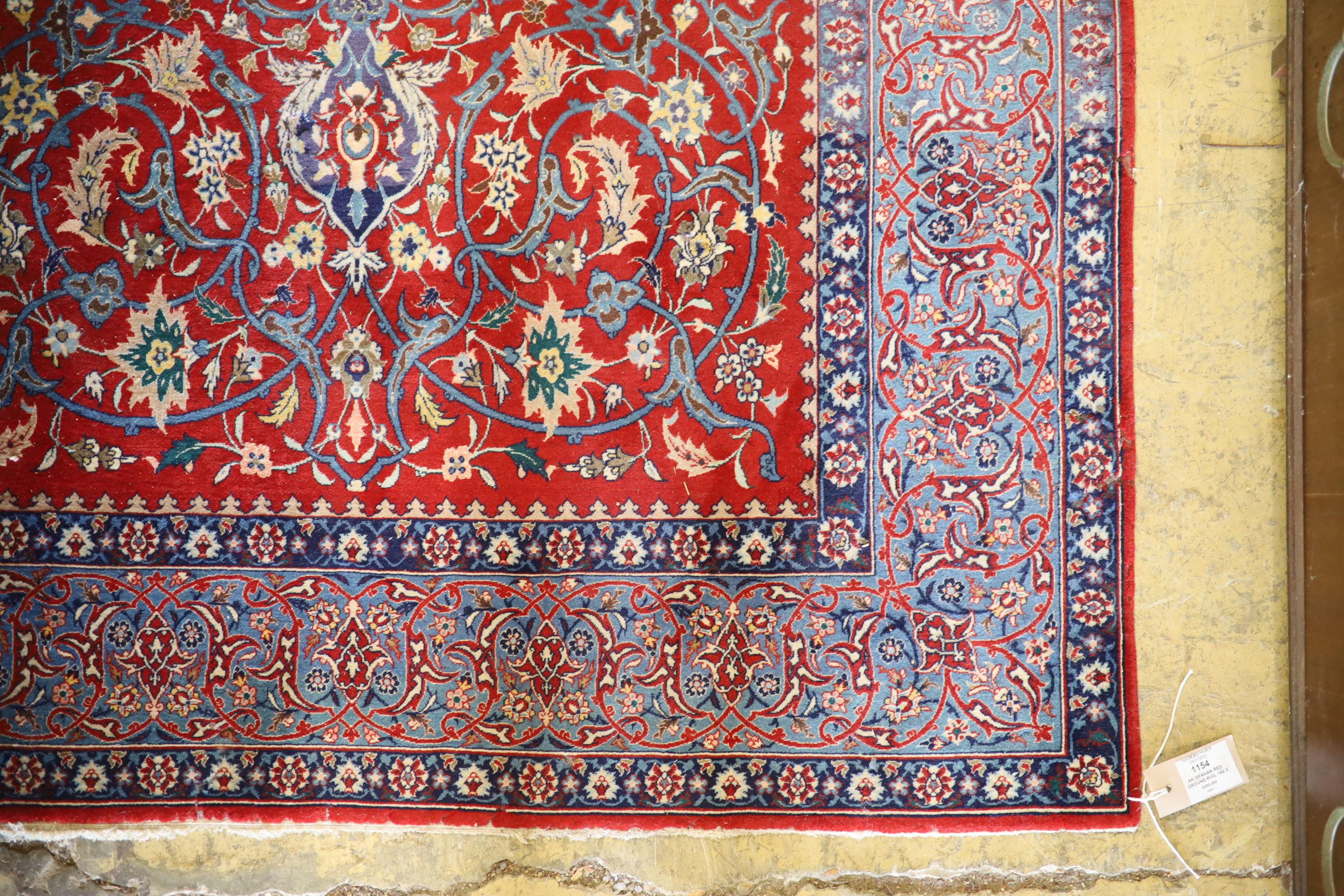 An Isfahan red ground rug, 169 x 110cm